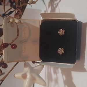 Sarah coventry.  Six rhinestone flower shape earrings